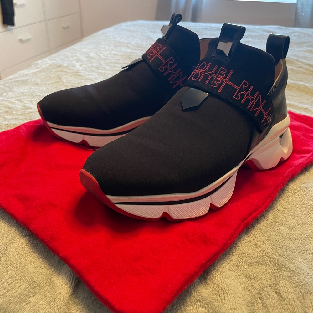 Black and Red Louboutin Slip-On Sneakers